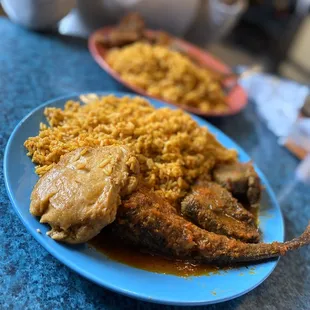 Moimoi fish and 2beef with jollof rice