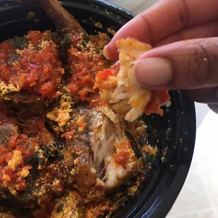 Egusi with two beef and fish (with Fufu).