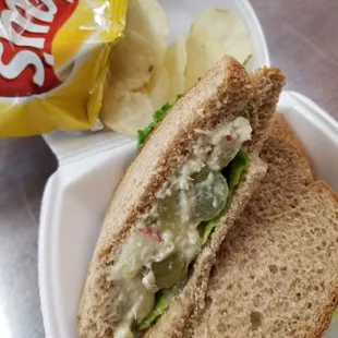 Chicken salad sandwich and a bag of chips