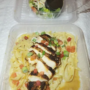 Blackened Chicken Alfredo Pasta w/side salad (they forgot the breadstick)
