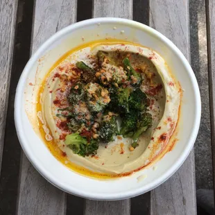 Broccoli hummus bowl, with dukkah, hazelnuts, and parsley ($10)