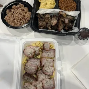 Pork belly over Mac and cheese and Jerk pork