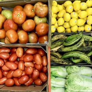 Lemons, tomatoes, plantains, roma tomatoes, napa cabbage.