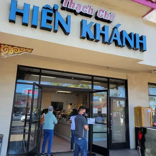 two people entering a restaurant