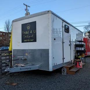 a trailer parked in a parking lot