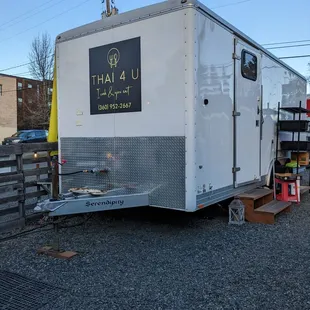 a trailer parked in a lot