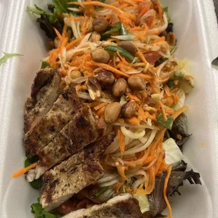 a chicken salad in a styrofoam container