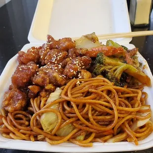 I got all this for $7.30. They&apos;re so generous that I had to ask for less. Clockwise from top left: sesame chicken, happy family, chow mien.