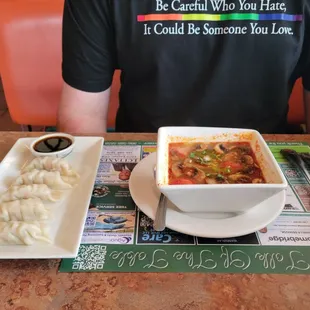 Steamed dumplings and Tom Yum soup