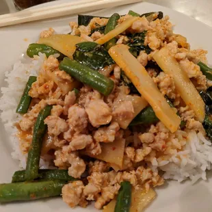 Pea ped with ground chicken over rice