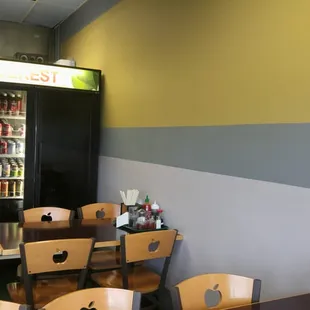 Nothing on walls. Apple cutout chairs