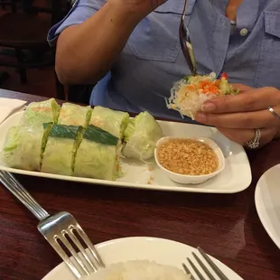 Soo good! Summer roll with sweet n sour sauce and peanuts. Makes eating healthy fun.