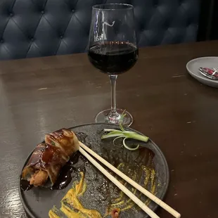 I was so excited and started eating the duck roll, so this is a partial roll   the wine is delicious also!!
