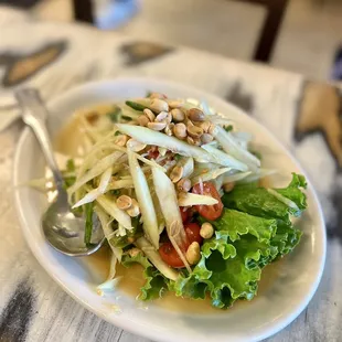 a plate of salad on a table