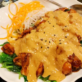 Chicken with a peanut sauce... lightly steamed spinach and fluffy rice... YUM!