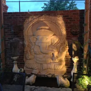 Beautiful outdoor seating actually reminds me of being in Southeast Asia.