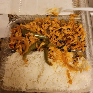 rice and vegetables in a plastic container