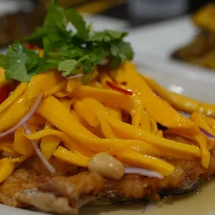 Deep fried trout with mango sauce
