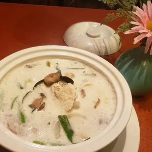 Coconut Soup (Tom Kha) Coconut broth simmered in galanga, kaffir leaves, bell peppers, lemon grass, onions, mushrooms and lime juice