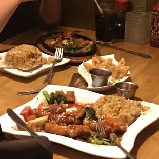 Crab puffs sesame chicken rice and shrimp and scallops