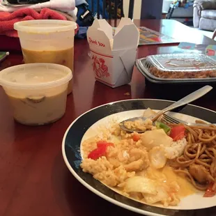 Left to right: Chicken coconut soup, chicken Panang curry, chicken Lo mein. On plate: steamed rice with the curry and Lo mein.