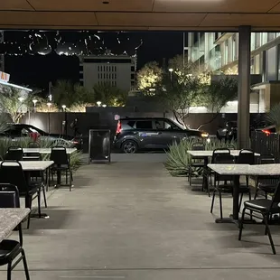 an empty restaurant with tables and chairs