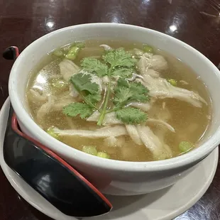 S6. Thai Noodle Soup: Savory chicken broth with tender glass noodles, fried garlic, and fresh cilantro for a perfect flavor boost!
