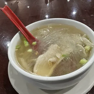 S6. Thai Noodle Soup: Savory chicken broth with tender glass noodles, fried garlic, and fresh cilantro for a perfect flavor boost!