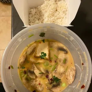 Tom Kha with fried tofu and a side of rice! Packed with mushrooms and lots of flavor! Not overly sweet or sour.