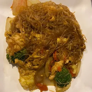 a plate of stir fried noodles