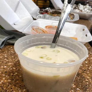 a bowl of soup with a spoon in it
