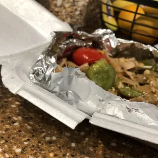 a paper plate of food