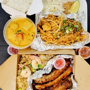 two take out boxes of food