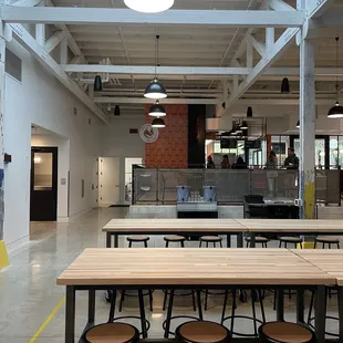 a restaurant with tables and chairs