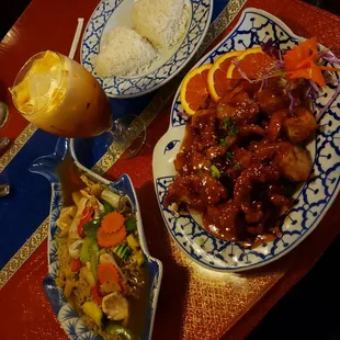 Orange chicken and added shrimp to it and chicken pad ba me. Also the drink is thai iced tea