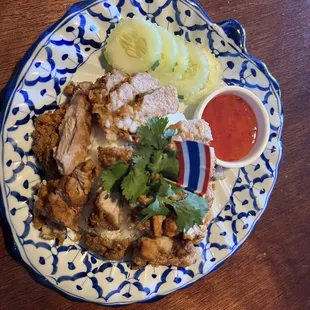 a plate of food on a wooden table