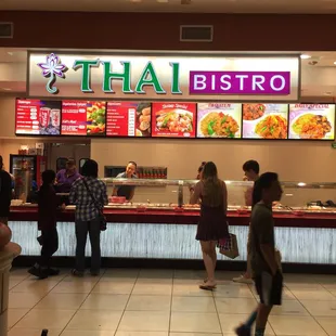 people standing in front of the counter