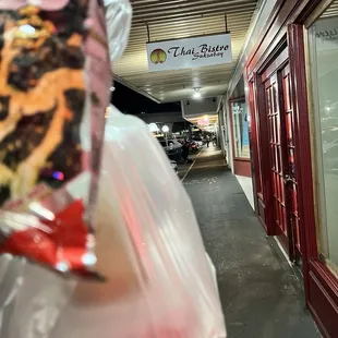 You can't see the greatness in this bag but I know it's in there  ( walk up view of Thai bistro)