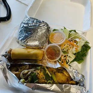 a meal in a styrofoam container
