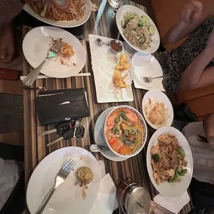 a table full of plates of food