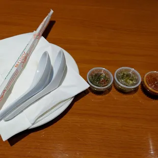 chopsticks, sauces, and condiments