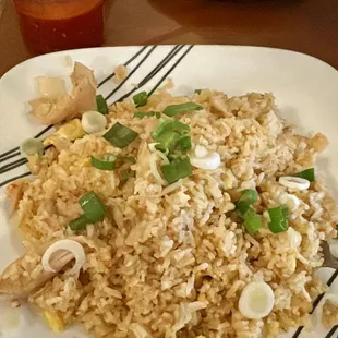 Fried rice with chicken (Hot) and yum sauce.