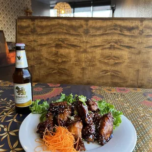 Try Our New Teriyaki Wings and pair it with Thailands favorite beer!