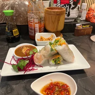 Shrimp spring rolls yumm yumm with the tiger cry sauce on the side!! Enjoy