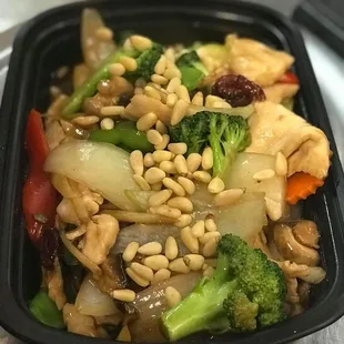 Pinenut Chicken: Assorted fresh vegetable stir fired with chicken, dried cranberry in ginger soy sauce and roasted pinenut on top