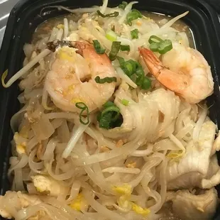 Pad Thai: a famous rice noodle dish with chicken , shrimp, egg, bean sprout, peanut