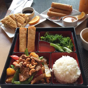 Beef Cashew Lunch Box Special with Thai Rolls and Scallion Pancakes on the side.