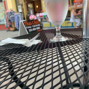 Sitting outside enjoying the weather and the farmer&apos;s market live music.