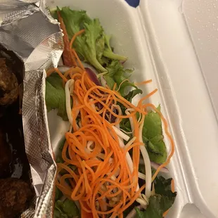 Salad with dressing underneath