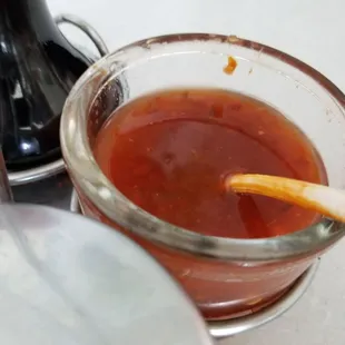 Watered down or old chili paste...don't try it, stick with the chili flakes